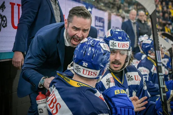 Team Slovakia forward Tomas Jurco Being Grabbed by His Head Coach