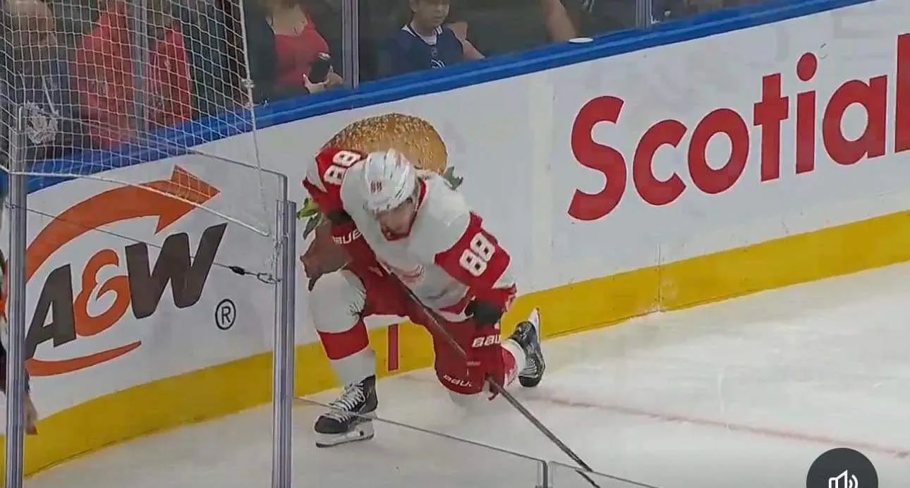 Patrick Kane doubled over in pain after suffering an injury against the Toronto Maple Leafs.