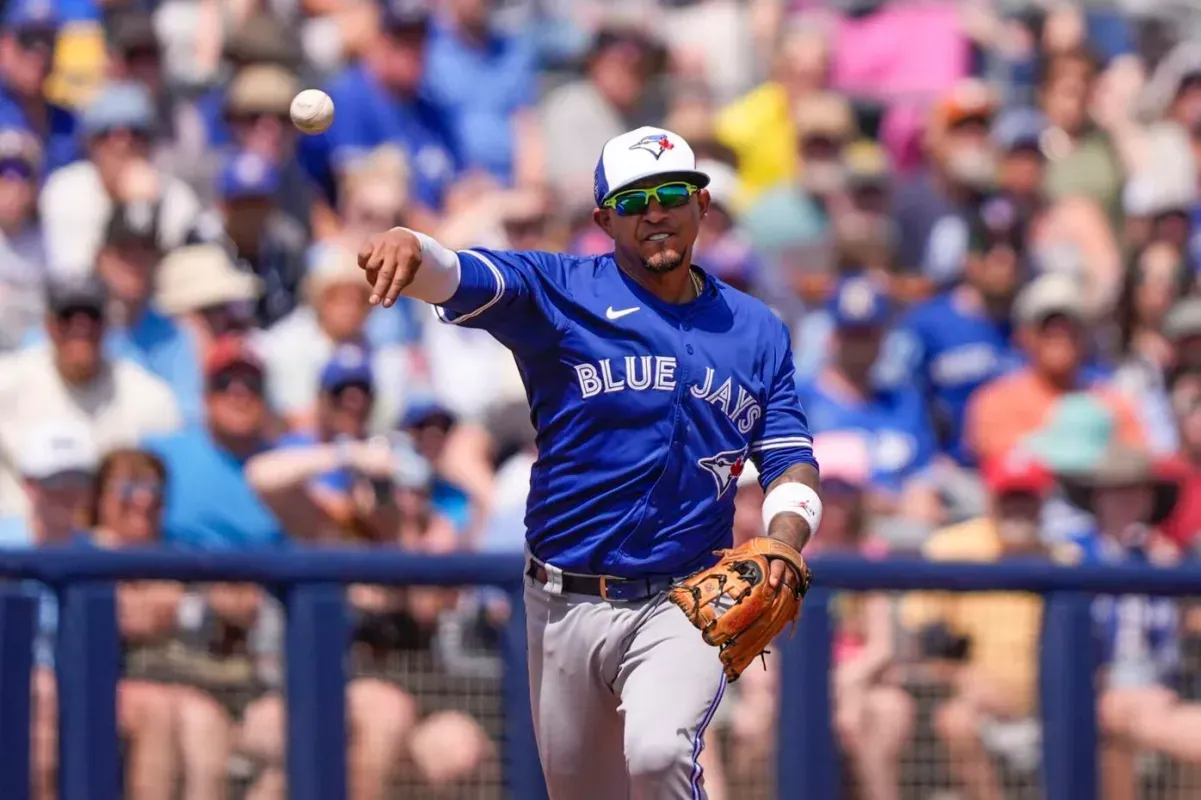 Eduardo Escobar throwing in warmups before Blue Jays game.
