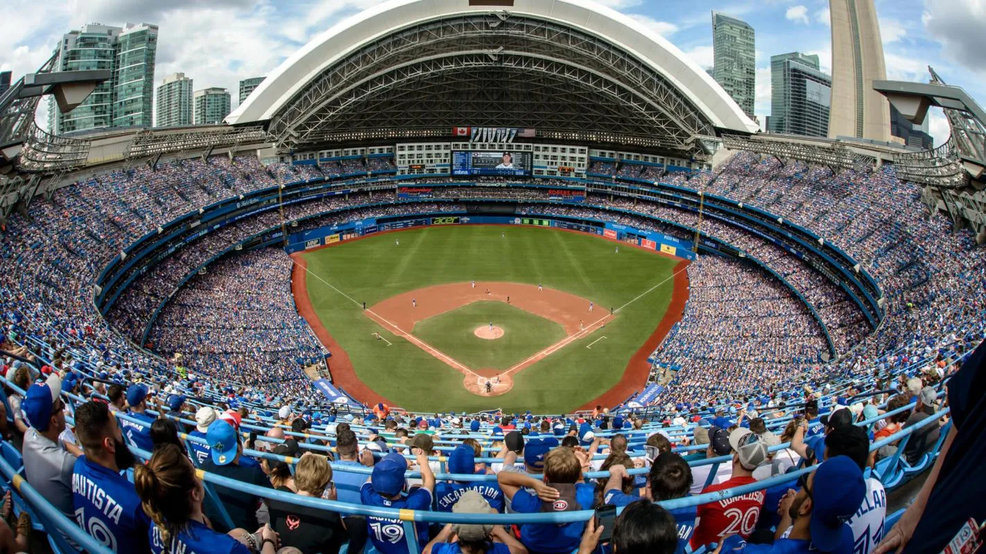 Fans watch as the Blue Jays play at Rogers Centre.