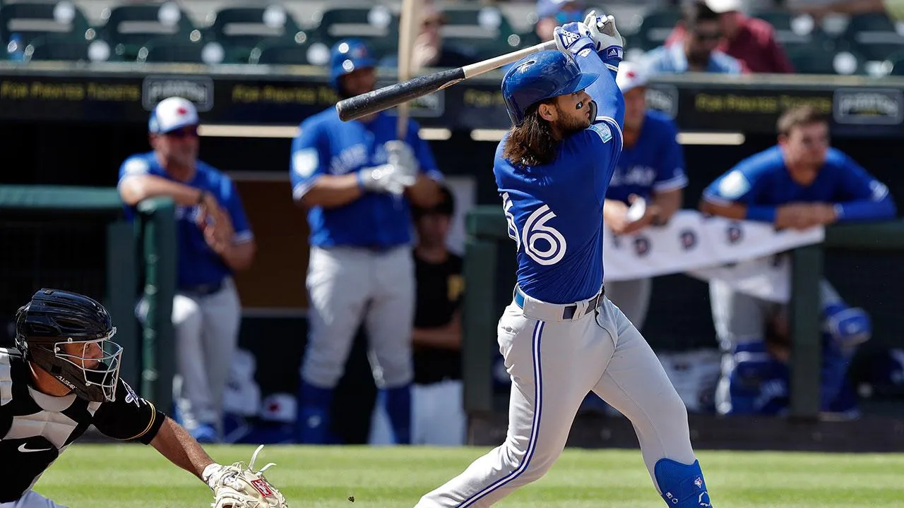 Bo Bichette hits the ball at Spring Training