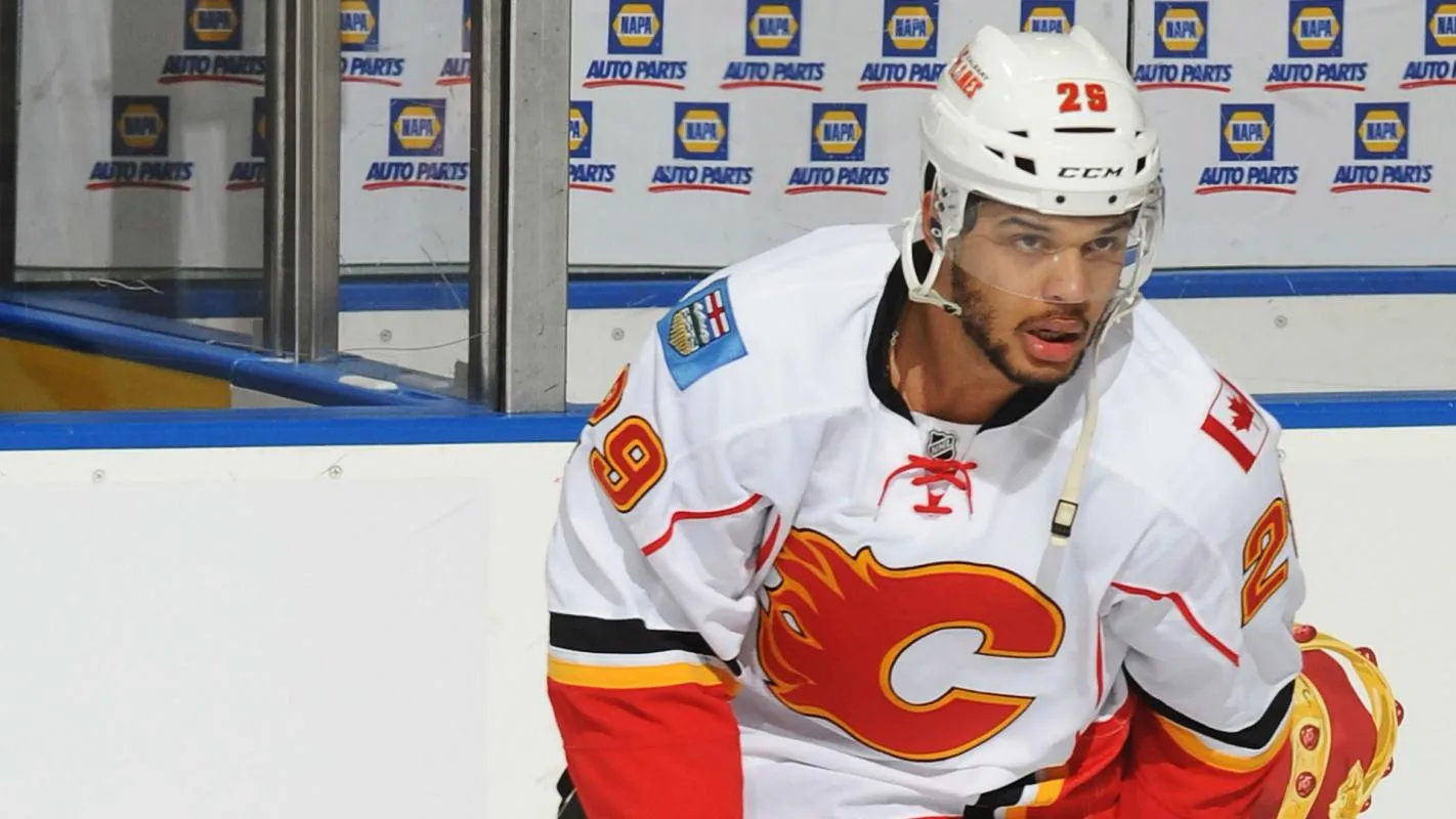 Former Calgary Flames forward Akim Aliu warming up for a road game in the NHL.