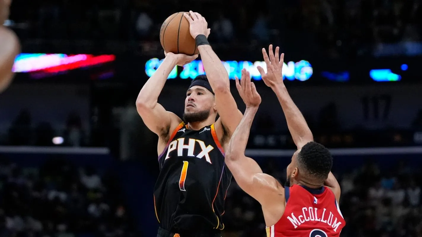 Devin Booker racks up 52 points, leading the Phoenix Suns to victory
