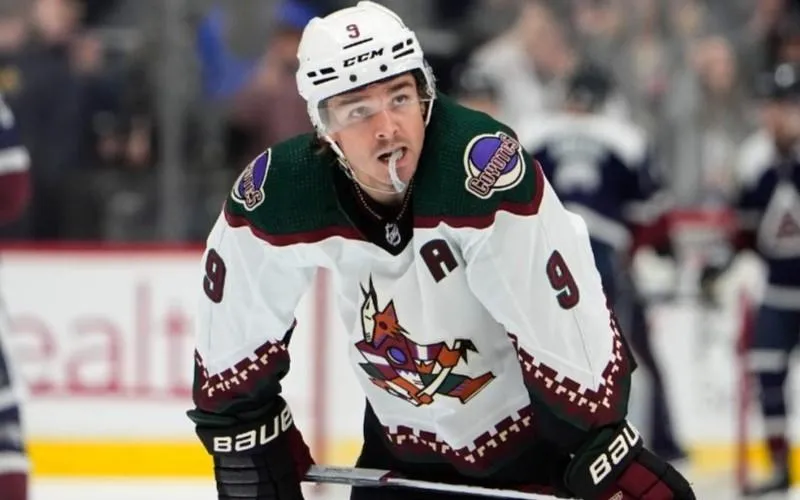Arizona Coyotes forward Clayton Keller preparing for a faceoff