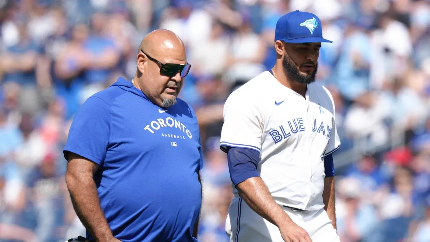 Toronto Blue Jays reliever Yimi Garcia exits the game in the 9th inning with an apparent elbow injury.