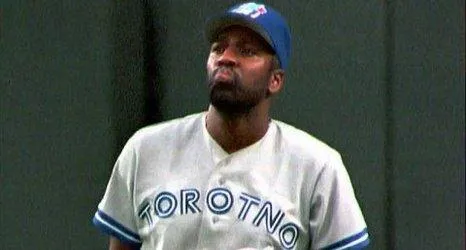 Joe Carter Wearing a Blue Jays jersey that misspelled Toronto