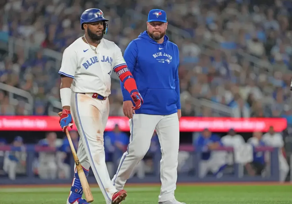 Vladimir Guerrero Jr. with Manager John Schneider