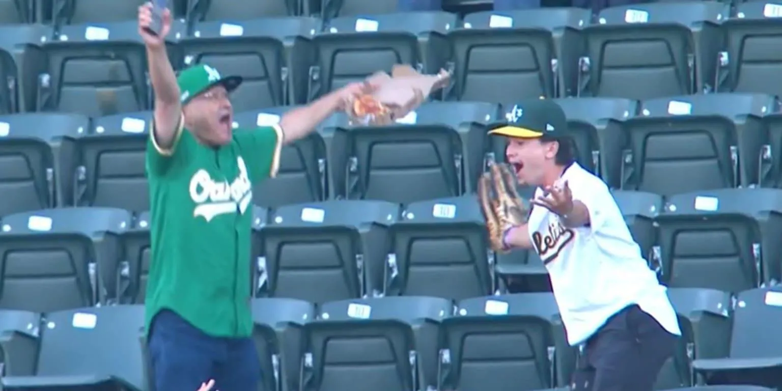 Oakand A's fan catches 3 foul balls in one game