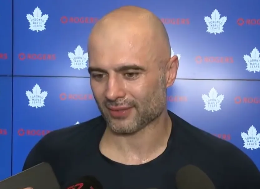 Former Toronto Maple Leafs defenseman Mark Giordano speaking to the media