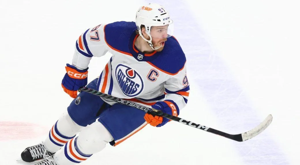 Edmonton Oilers forward Connor McDavid skating during an away game in the NHL.