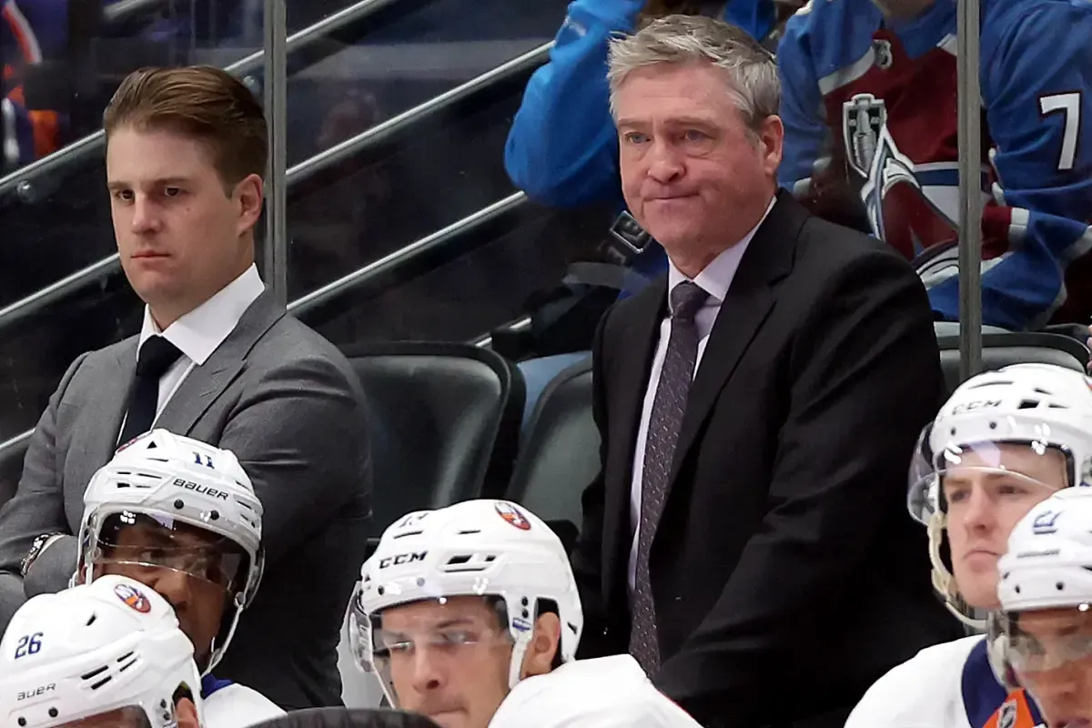 New York Islanders head coach Patrick Roy looks unhappy behind bench