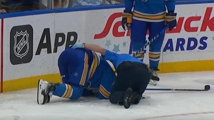 Nov. 2, 2024: St. Louis Blues defenseman Philip Broberg getting assistance from a member of the medical unit after being injured in an incident with Toronto Maple Leafs forward Mitch Marner during a game.