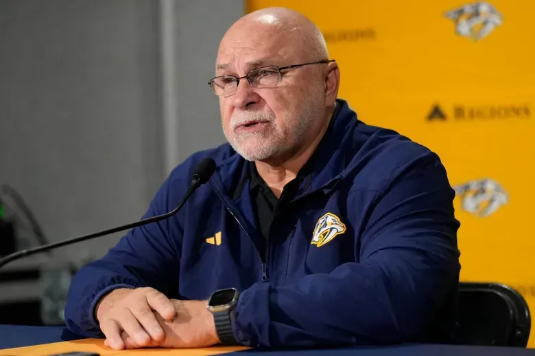 Nashville Predators general manager Barry Trotz speaks to the media