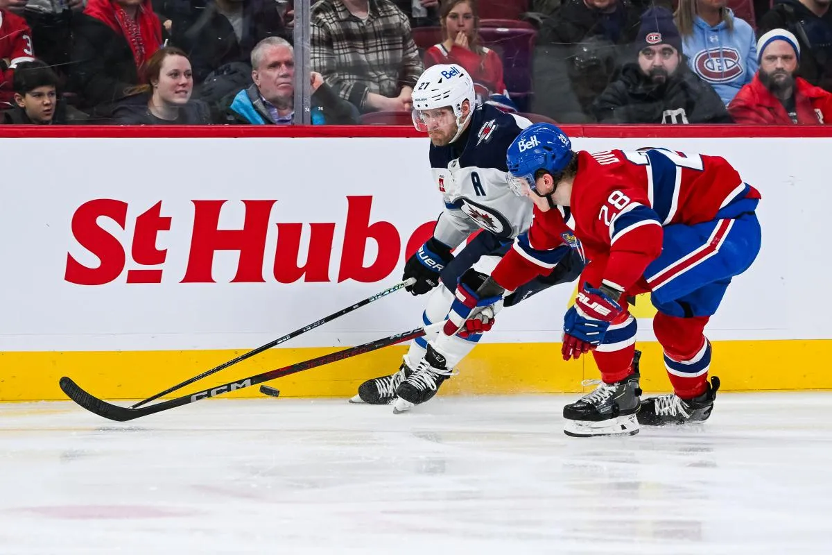 nikolaj Ehlers against Christian Dvorak of the Montreal Canadiens