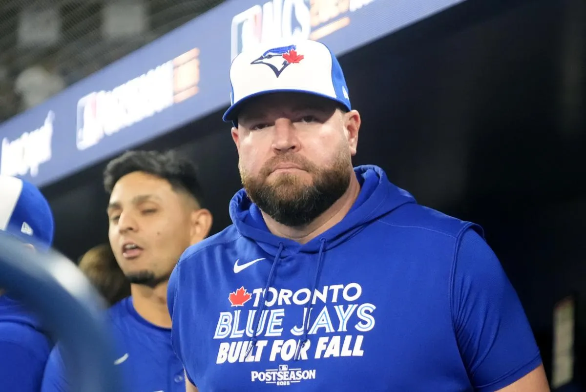 Toronto Blue Jays manager John Schneider (14) looks on before game one against the Seattle Mariners in the ALCS round for the 2025 MLB playoffs at Rogers Centre.