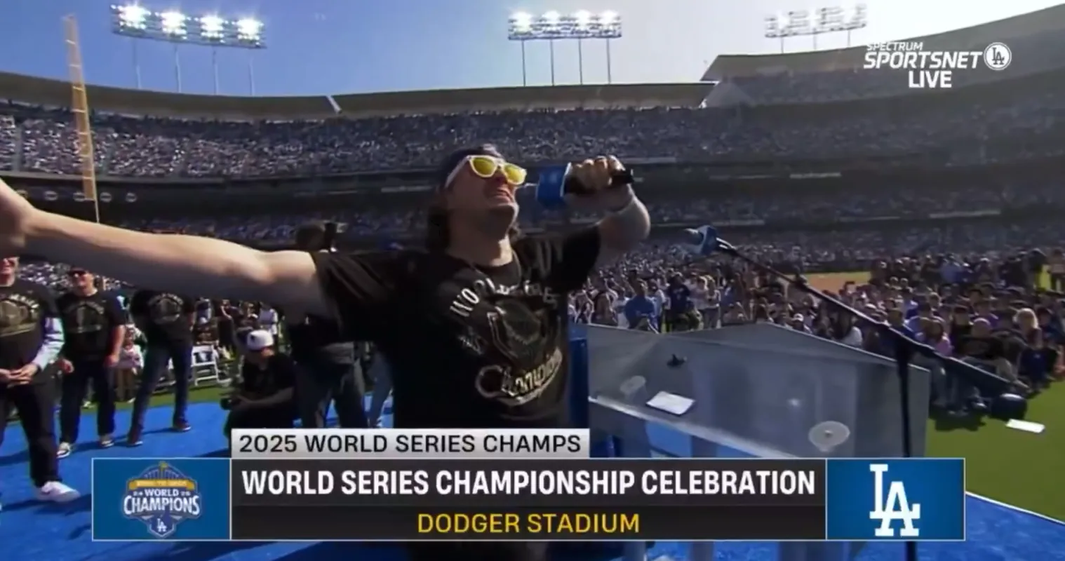 Enrique Hernandez takes aim at the Blue Jays during celebration