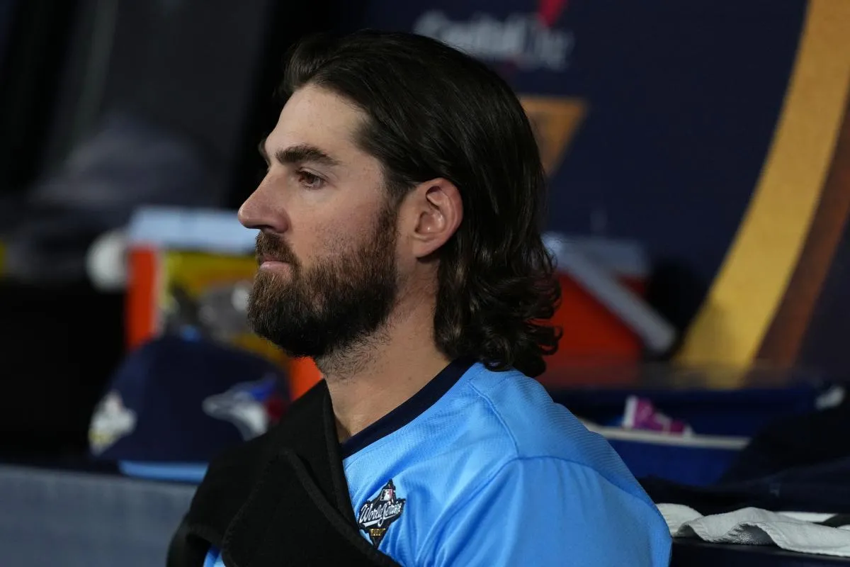 Toronto Blue Jays pitcher Kevin Gausman (34) sits in the dug out in-beween inningr fifth inning for game six of the 2025 MLB World Series at Rogers Centre.