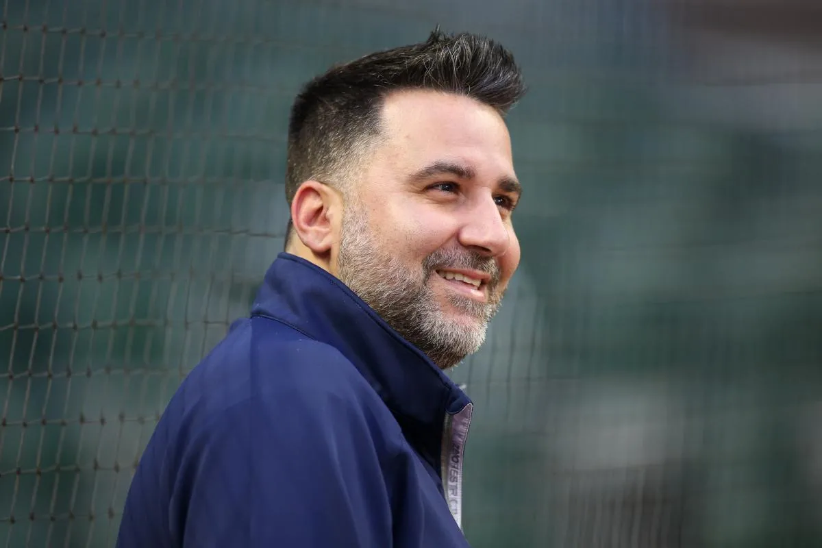 Atlanta Braves general manager Alex Anthopoulos watches a workout before the NLDS against the Philadelphia Phillies at Truist Park.