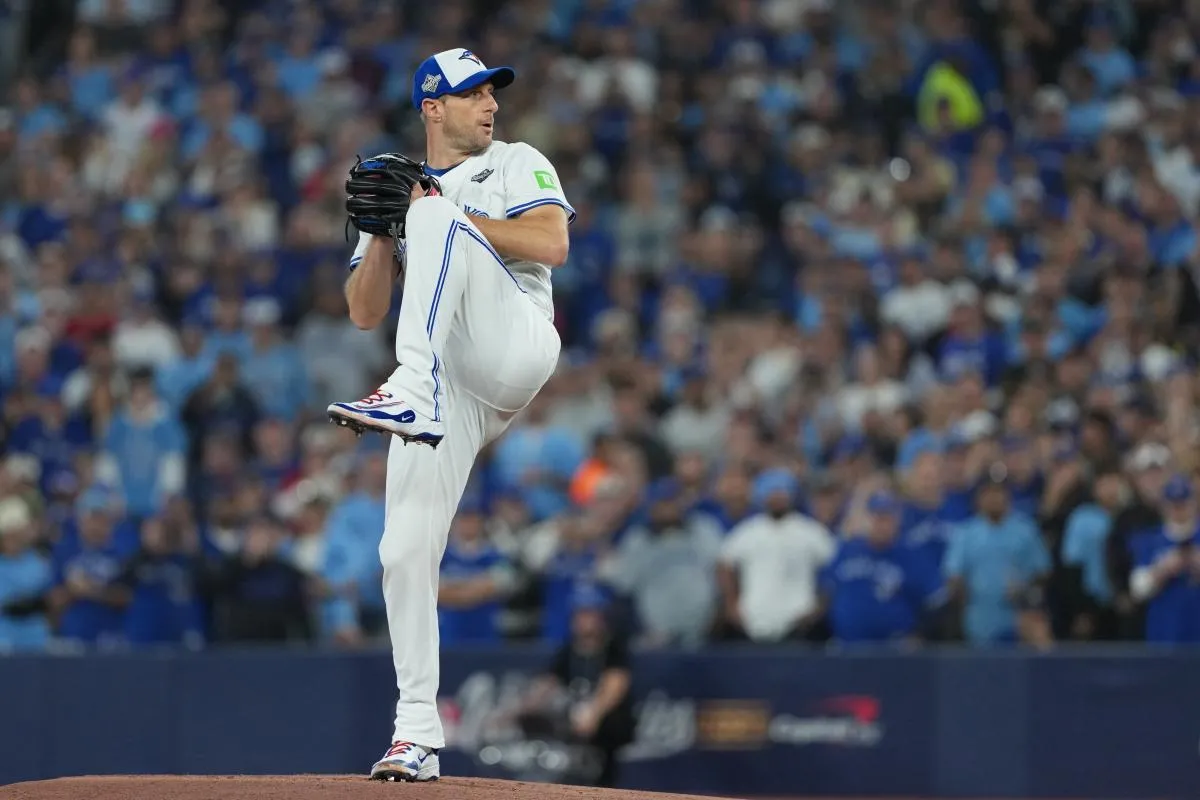Toronto Blue Jays pitcher Max Scherzer (31) throws a pitch against the Los Angeles Dodgers in the first inning for game seven of the 2025 MLB World Series at Rogers Centre.