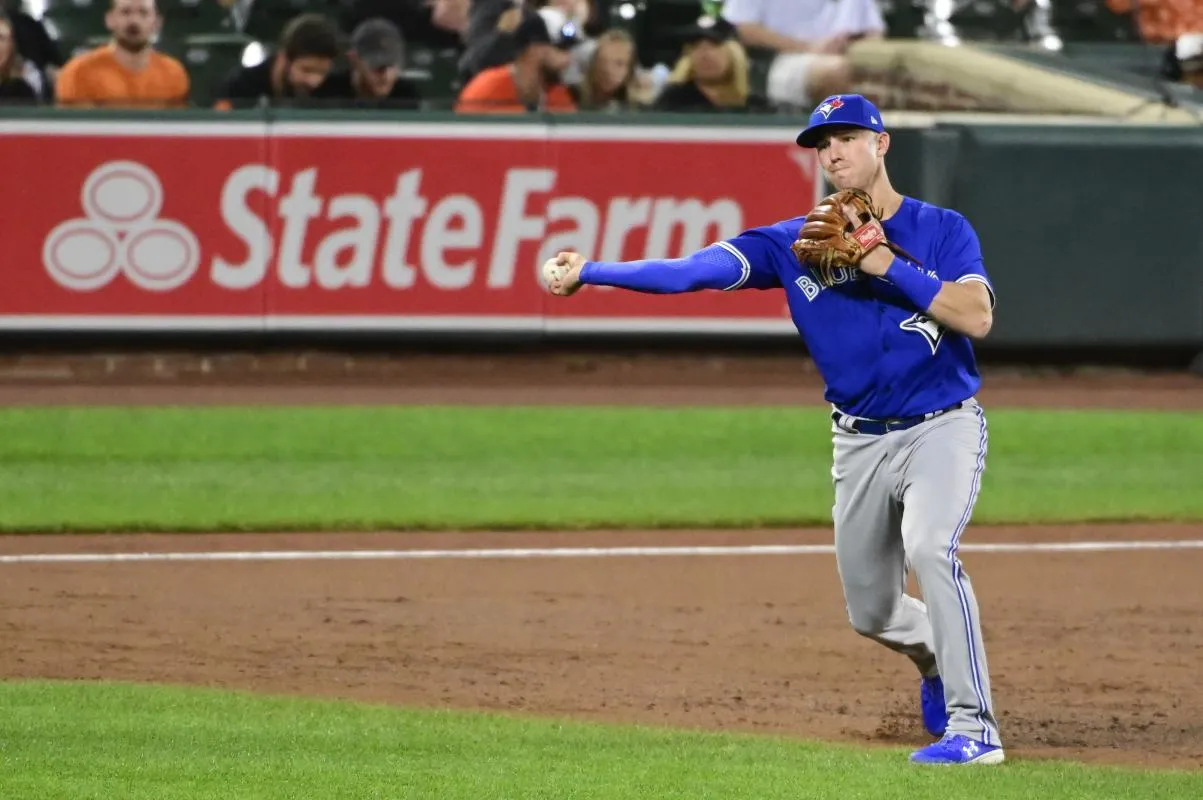 Toronto Blue Jays third baseman Jake Lamb (2) throws to first base during the game against the Baltimore Orioles at Oriole Park at Camden Yards.