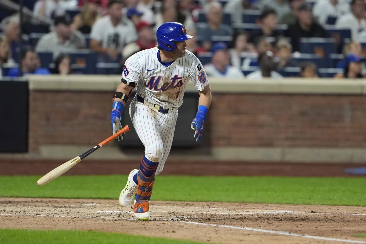 New York Mets second baseman Jeff McNeil (1) hits an RBI single against the Philadelphia Phillies during the fourth inning at Citi Field.