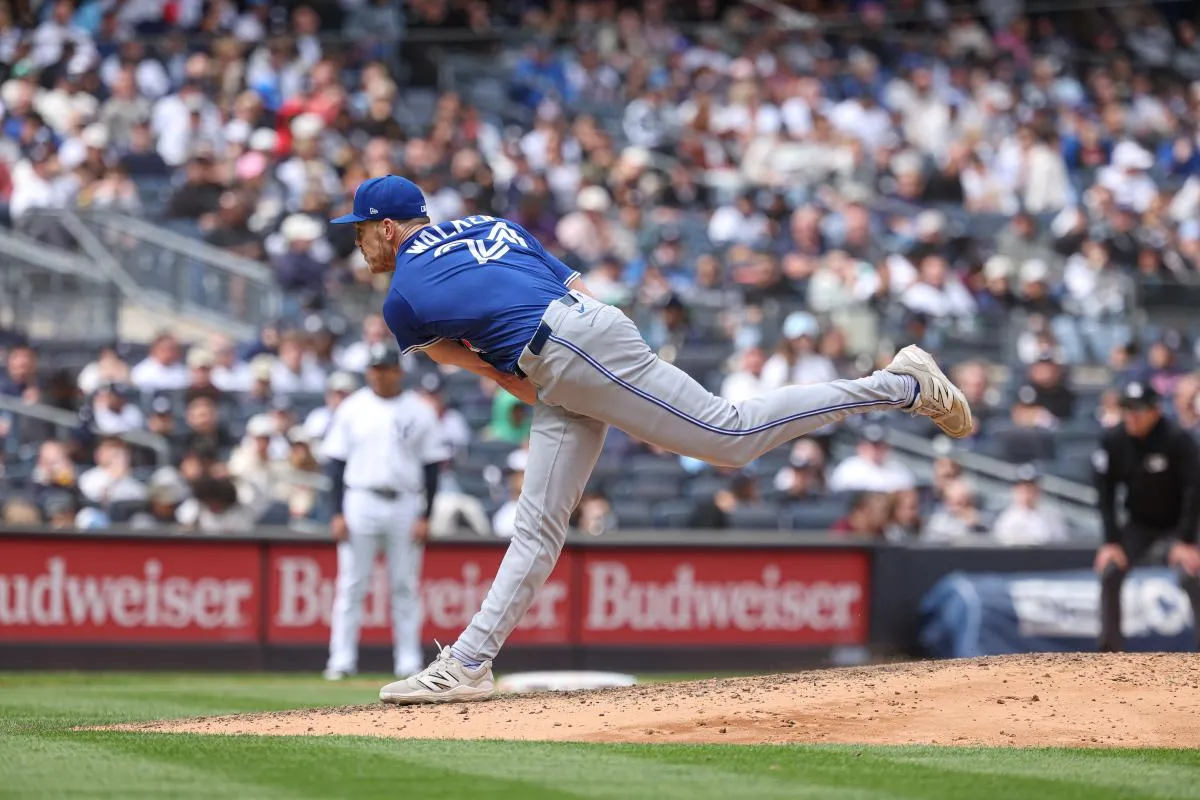 Toronto Blue Jays relief pitcher Josh Walker (21) delivers a pitch during the seventh inning against the New York Yankees at Yankee Stadium.