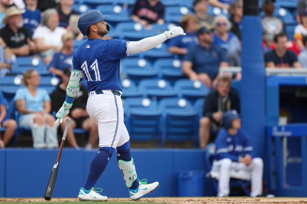 Toronto Blue Jays shortstop Bo Bichette (11) hits a home run against the Houston Astros in the third inning during spring training at TD Ballpark.