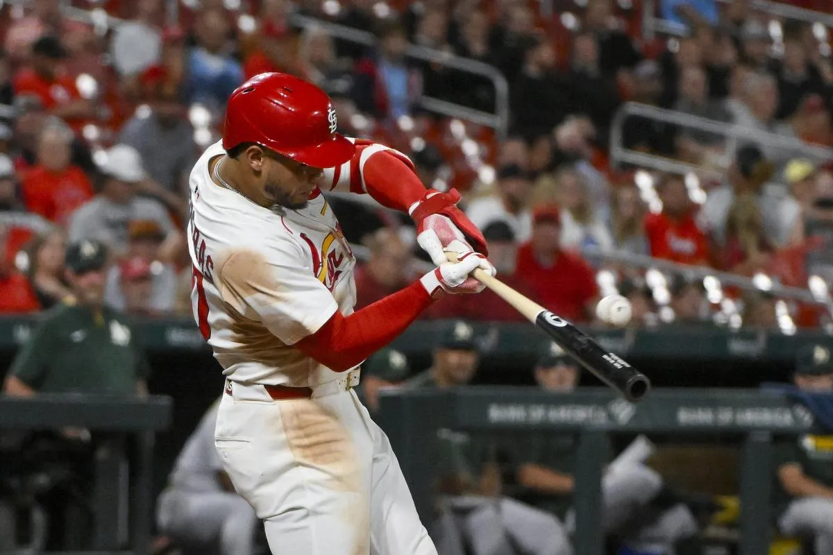 St. Louis Cardinals first baseman Willson Contreras (40) hits a two run triple against the Athletics during the eighth inning at Busch Stadium.