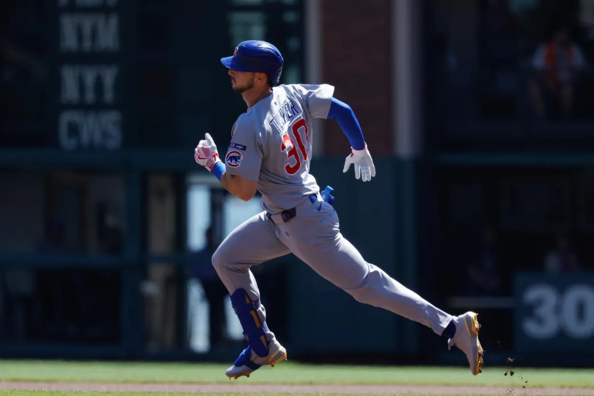 Chicago Cubs designated hitter Kyle Tucker (30) runs the bases after hitting a single during the first inning against the San Francisco Giants at Oracle Park.
