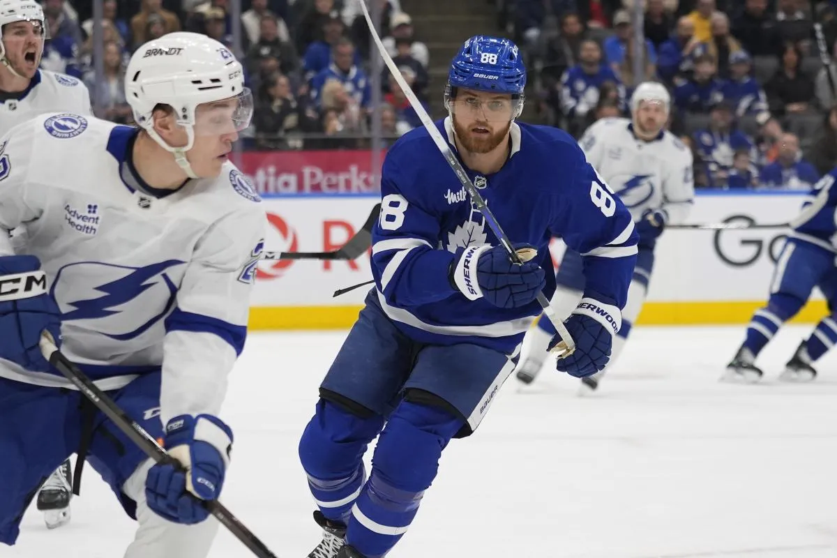 Toronto Maple Leafs forward William Nylander (88) pursues Tampa Bay Lightning forward Pontus Holmberg (29) during the first period at Scotiabank Arena.