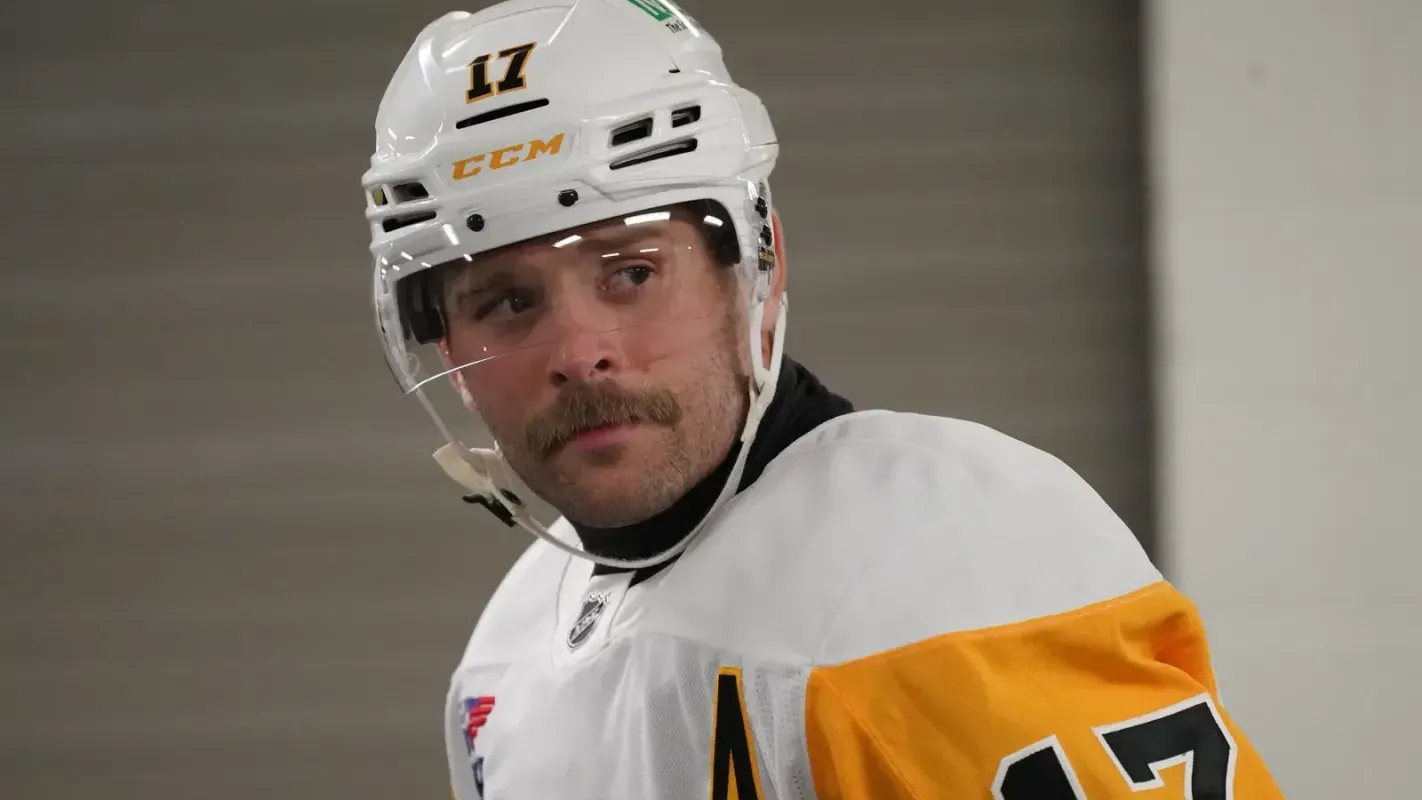 Pittsburgh Penguins' Bryan Rust looks to the side