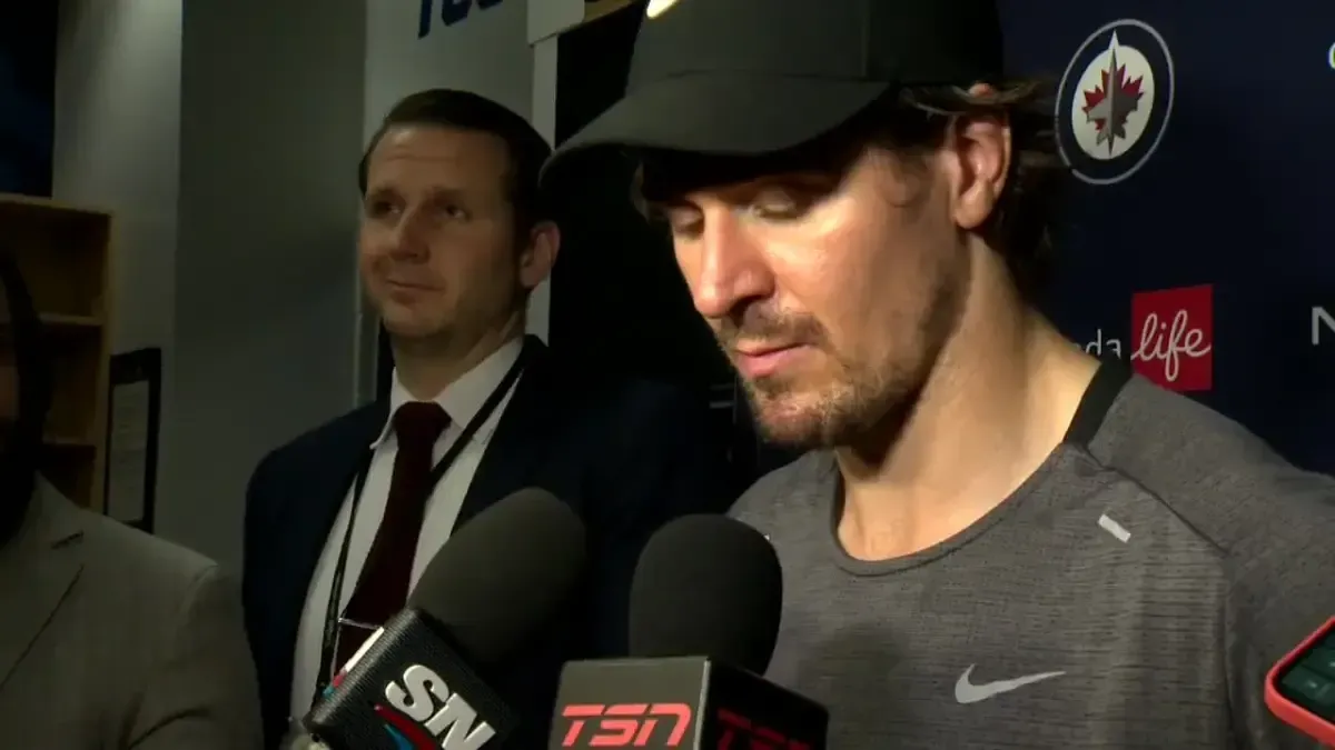 Winnipeg Jets speaks to the media in an emotional state