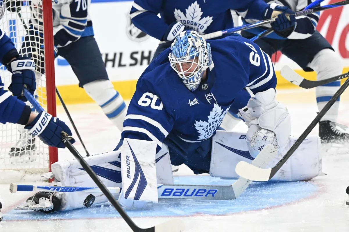 Toronto Maple Leafs goalie Joseph Woll (60) makes a save against the Winnipeg Jets in the second period at Scotiabank Arena.