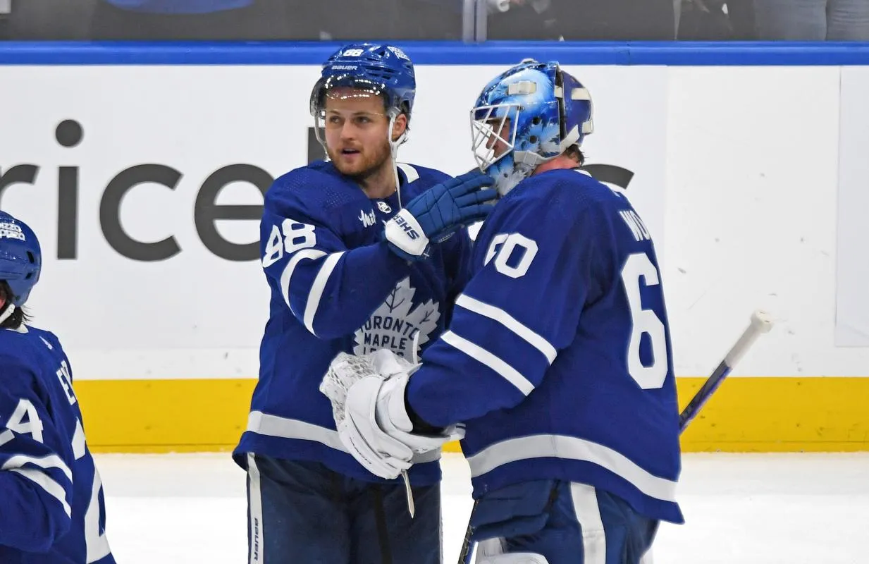 Toronto Maple Leafs forward William Nylander (88) and goalie Joseph Woll (60) celebrate after a win over the Boston Bruins in game six of the first round of the 2024 Stanley Cup Playoffs at Scotiabank Arena