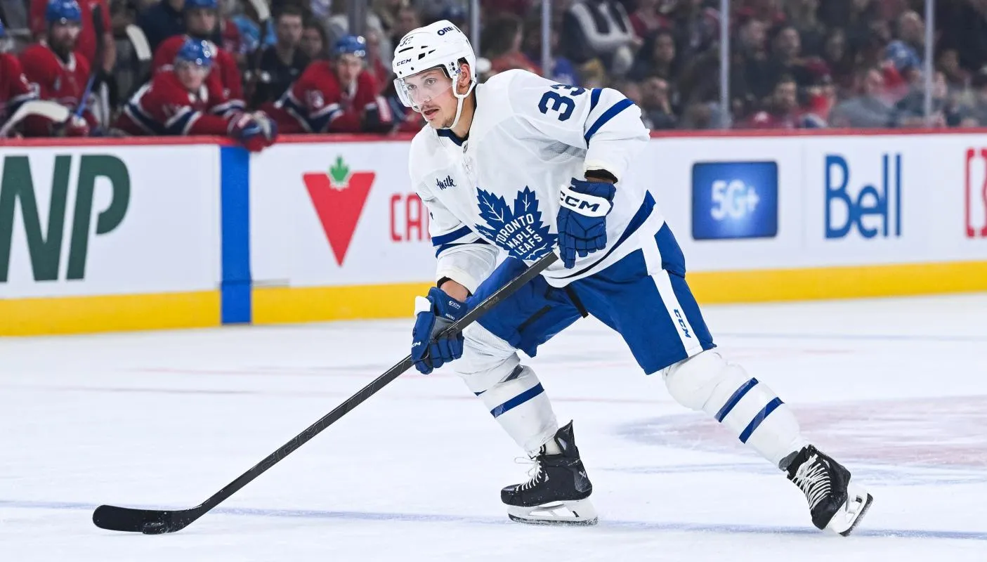 Toronto Maple Leafs defenseman Matt Benning (33) plays the puck against the Montreal Canadiens during the second period at Bell Centre