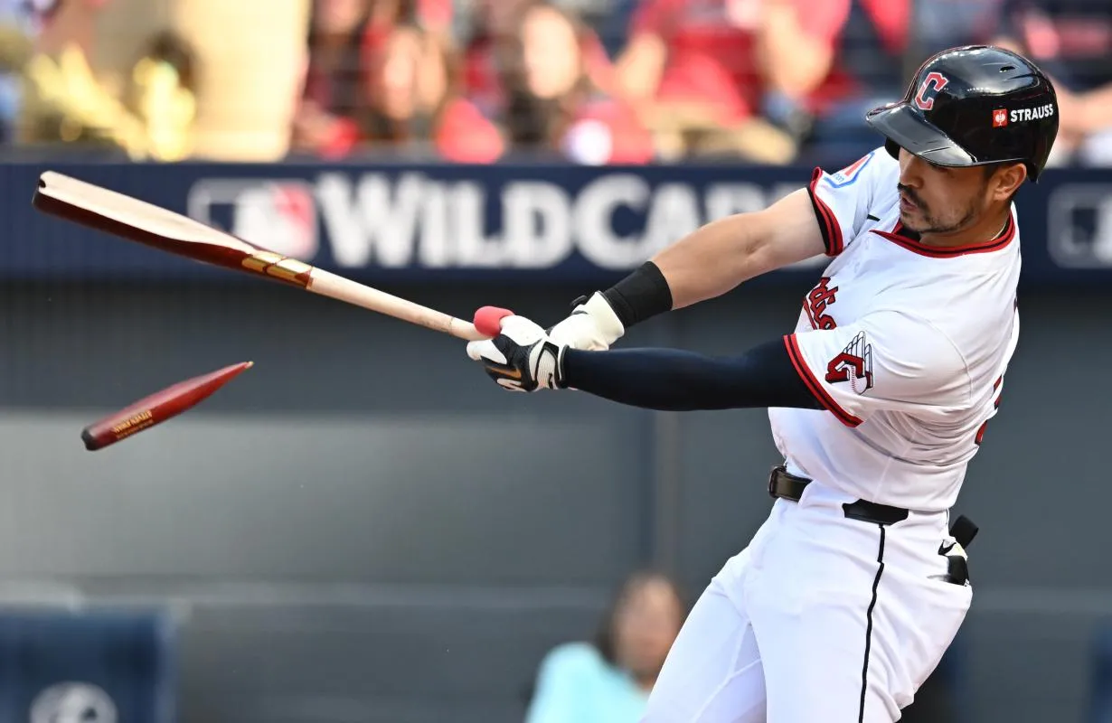 Cleveland Guardians outfielder Steven Kwan (38) breaks his bat on a ground out in the third inning against the Detroit Tigers during game three of the Wildcard round for the 2025 MLB playoffs at Progressive Field.