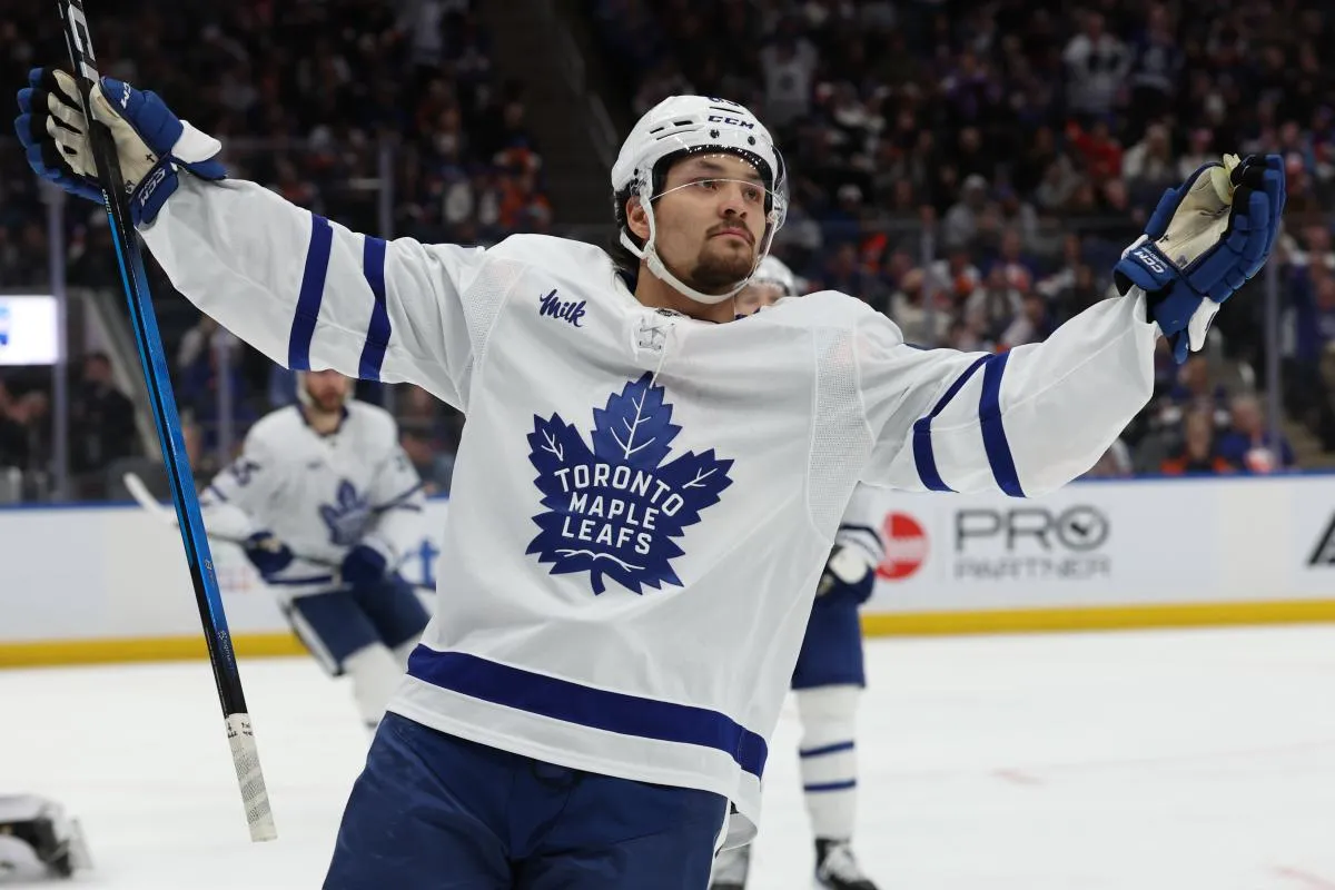 Toronto Maple Leafs left wing Nicholas Robertson (89) celebrates after scoring a goal against the New York Islanders during the third period at UBS Arena.
