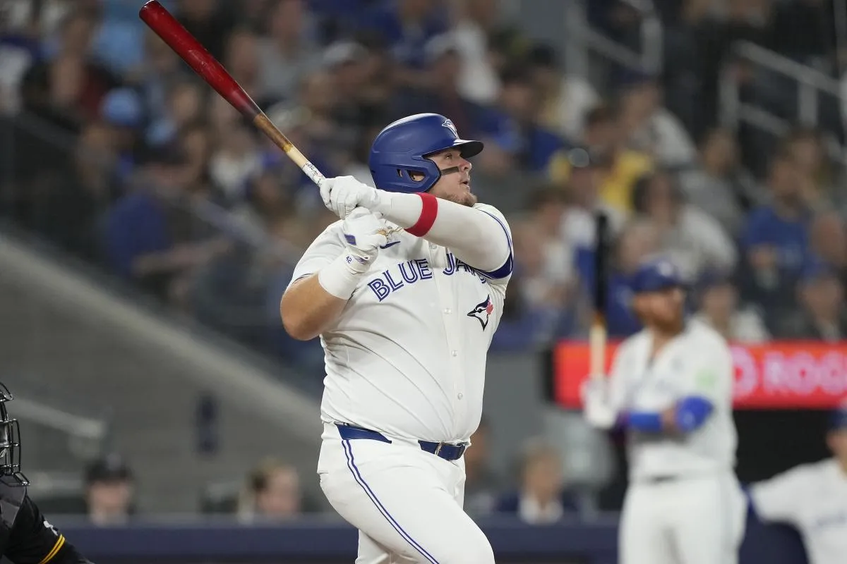 Toronto Blue Jays designated hitter Daniel Vogelbach (20) hits a two-run double against the Pittsburgh Pirates during the fifth inning at Rogers Centre.