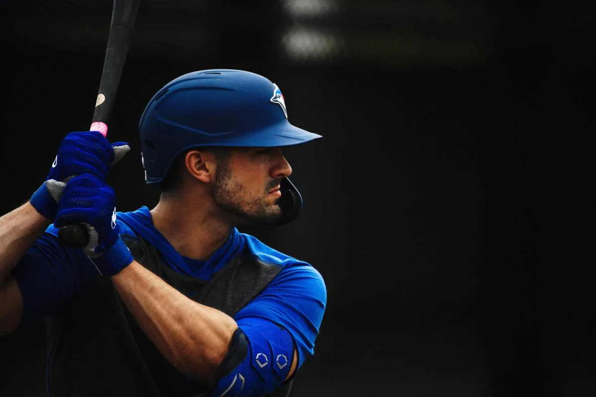 Toronto Blue Jays center fielder Randal Grichuk (15) takes live batting practice during spring training at Spectrum Field.
