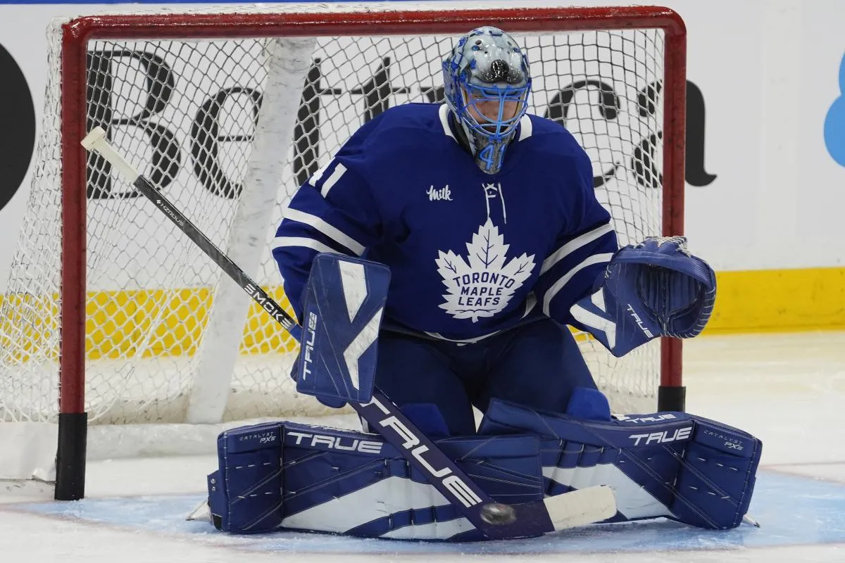 Toronto Maple Leafs goaltender Anthony Stolarz (41) makes a save during warm up before a game against the Calgary Flames at Scotiabank Arena.