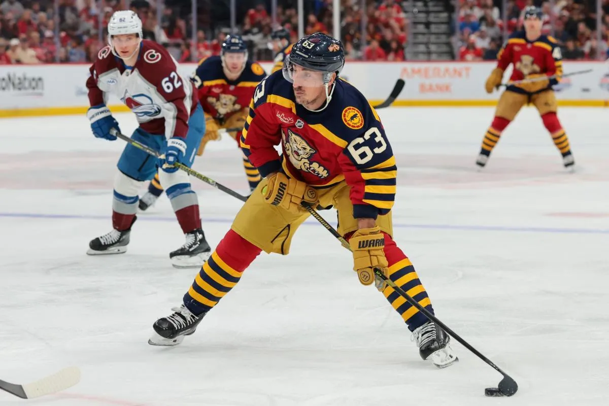 Florida Panthers left wing Brad Marchand (63) moves the puck against the Colorado Avalanche during the first period at Amerant Bank Arena.