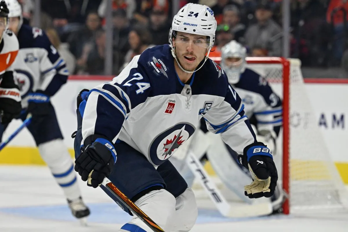Winnipeg Jets defenseman Haydn Fleury (24) defends against the Philadelphia Flyers at Wells Fargo Center.