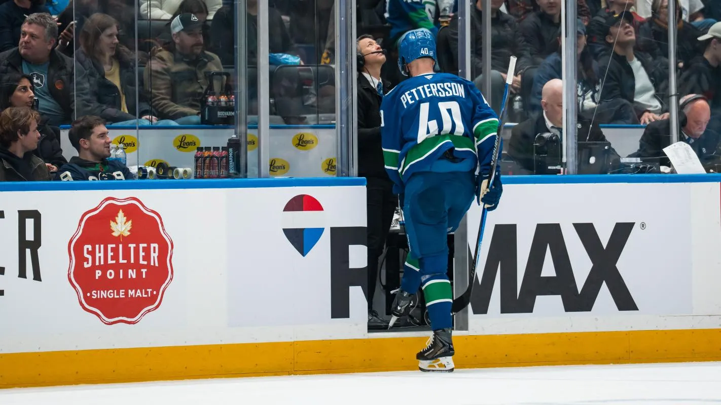 Vancouver Canucks forward Elias Pettersson (40) steps into the penalty box against the Seattle Kraken in the second period at Rogers Arena.