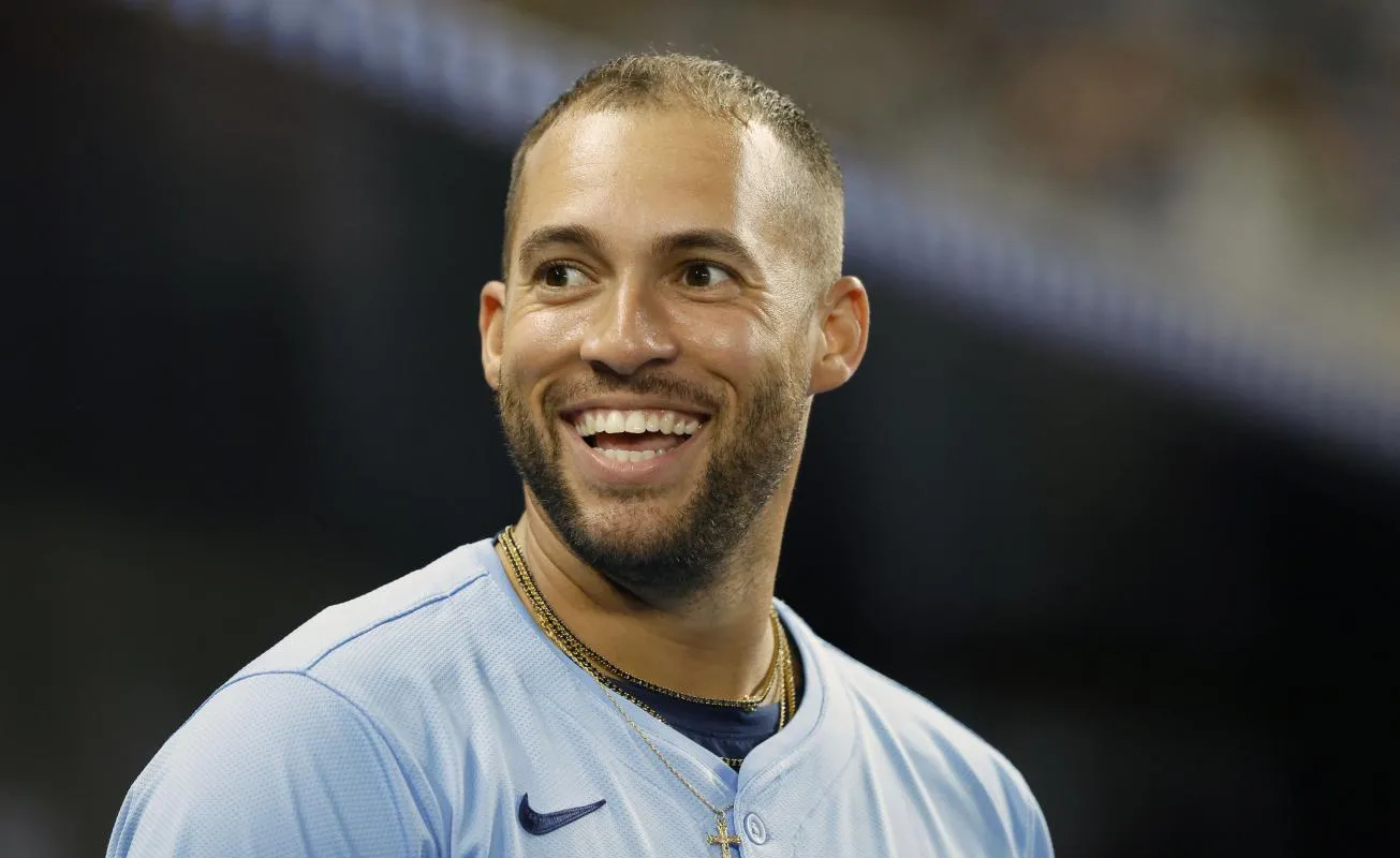 Toronto Blue Jays right fielder George Springer (4) reacts in the dugout against the Miami Marlins during the seventh inning at loanDepot Park.