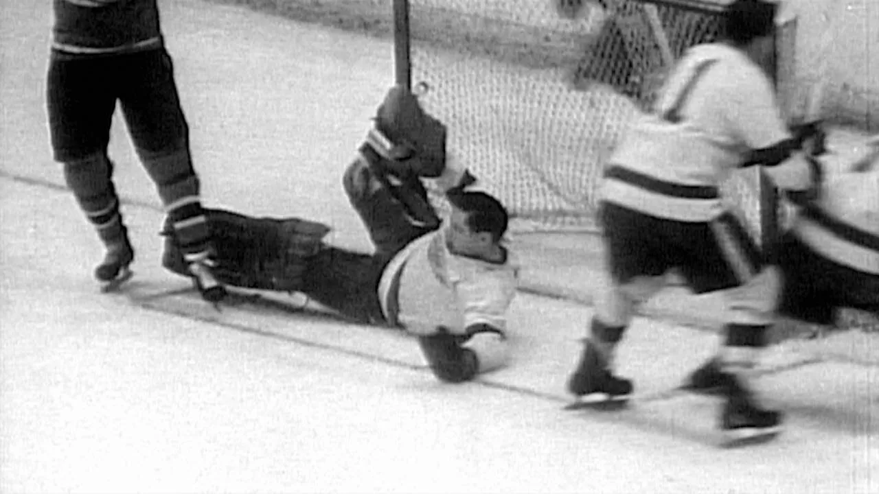 Glenn Hall makes a tremendous save in net