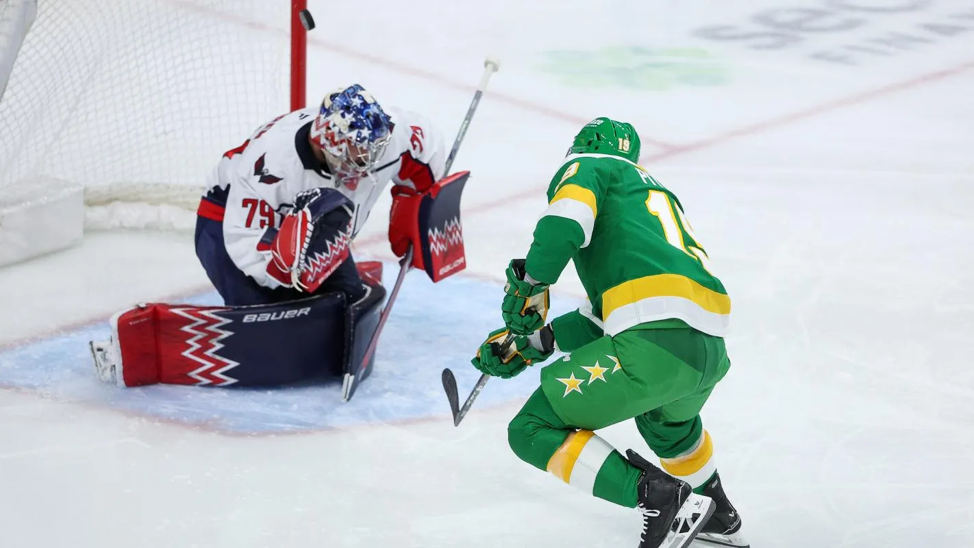Minnesota Wild center Tyler Pitlick (19) shoots the puck against Washington Capitals goaltender Charlie Lindgren (79) during the second period at Grand Casino Arena.