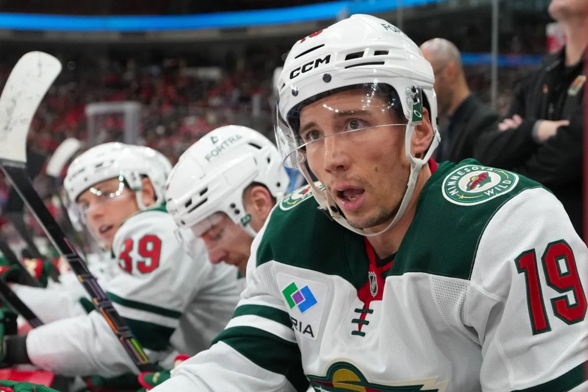 Minnesota Wild center Tyler Pitlick (19) looks on from the players bench Carolina Hurricanes during the first period at Lenovo Center.