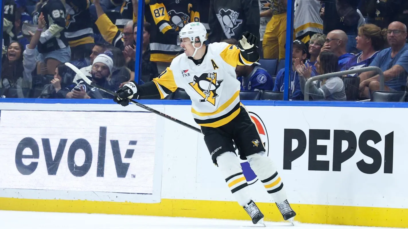 Pittsburgh Penguins center Evgeni Malkin (71) reacts after scoring a goal against the Tampa Bay Lightning in the third period at Benchmark International Arena.
