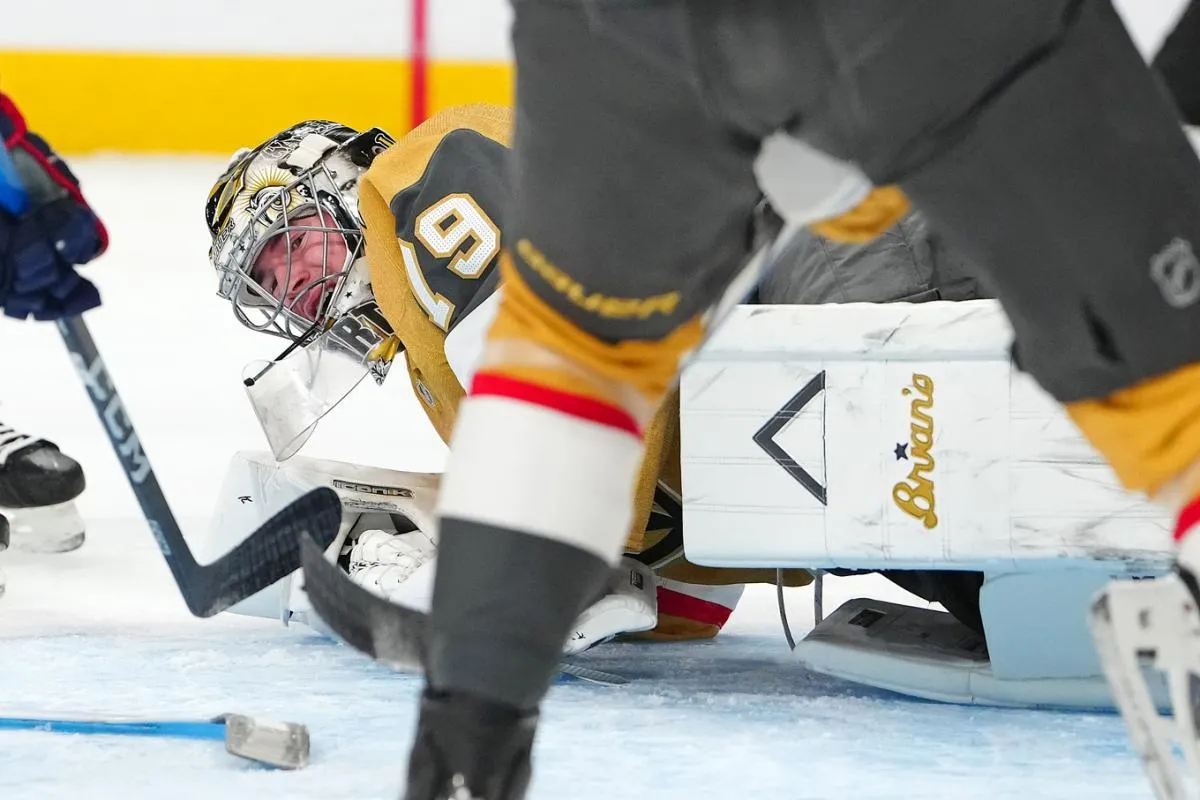Vegas Golden Knights goaltender Carter Hart (79) attempts to defend his net against the Columbus Blue Jackets after sustaining an apparent injury during the first period at T-Mobile Arena.