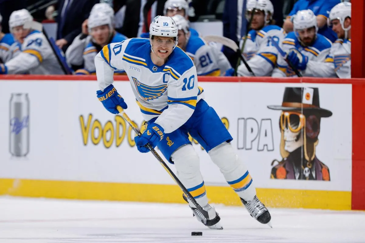 St. Louis Blues center Brayden Schenn (10) controls the puck in the third period against the Colorado Avalanche at Ball Arena.
